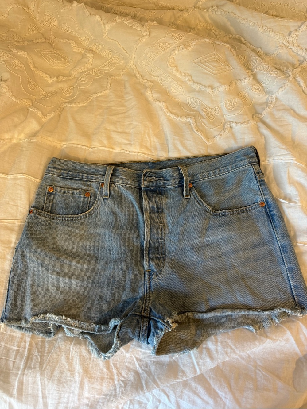 Levi's Light Blue Frayed Denim Cutoff Shorts